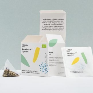 Square open package of herbal infusion Remedium Digestive with single tea bag and herbs